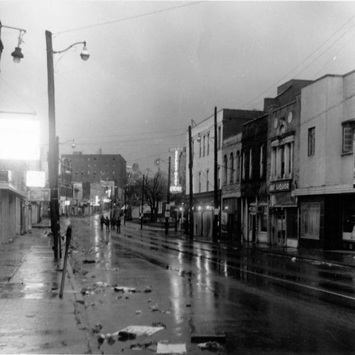 The 1968 Memphis Sanitation Workers strike and near daily protests reached the ears of Dr. Martin Luther King Jr, and he came to lead a massive protest. Vastly larger than previous protests, this one quickly broke out into disarray, leading Dr. King and his team to evacuate to safety. This photo captures the remains of that chaotic march on Beale St.