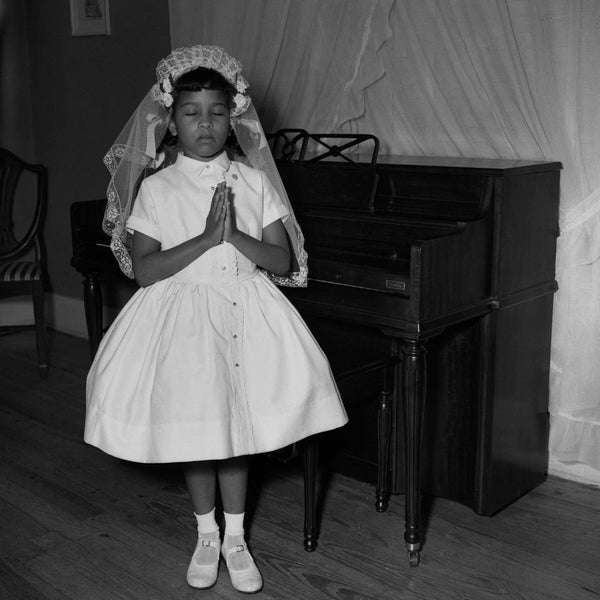 Ernest Withers was scheduled to photograph Debra Nell Brittenum’s first communion at St. Augustine Catholic Church, but he missed it. He arrived at the family’s home later that evening and asked her to re-dress and recreate the post. Decades later, Debra was quoted as saying, ‘I’m clearly asleep in the photograph, and I certainly was never an angel.