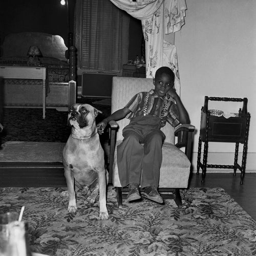 In homes like this across Memphis, love and laughter thrived despite segregation’s walls. Withers documented not just struggle, but everyday joy — the quiet moments that proved resilience is as much about family (including pets) as it is about protest